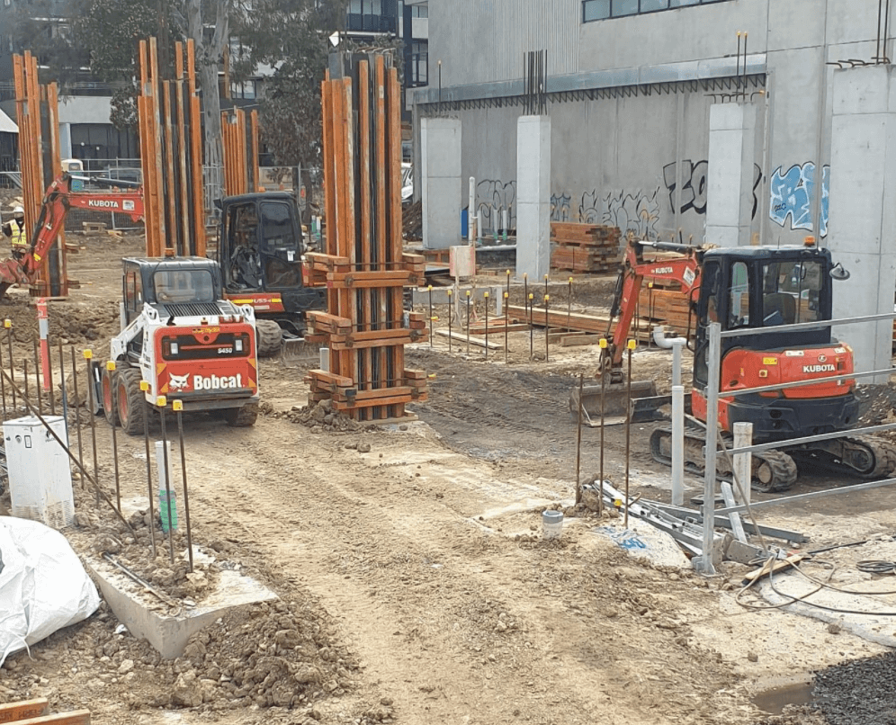bobcat skid steer and excavators on site in eltham, construction site