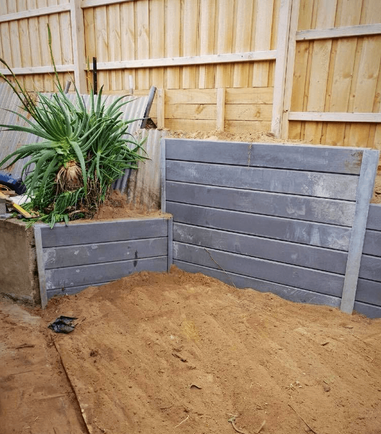 concrete sleeper retaining wall setup