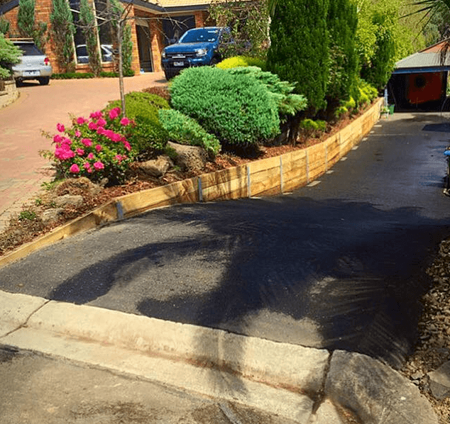 driveway and timber retaining wall