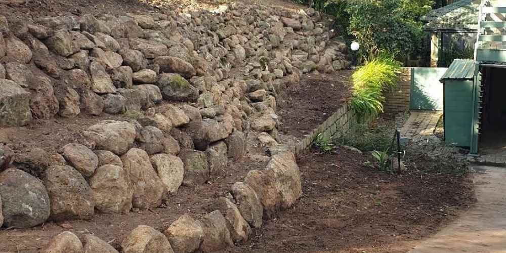 Garbion Retaining Walls in Backyard - Hammer Excavations