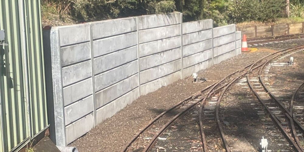 Concrete retaining wall - Hammer Excavation