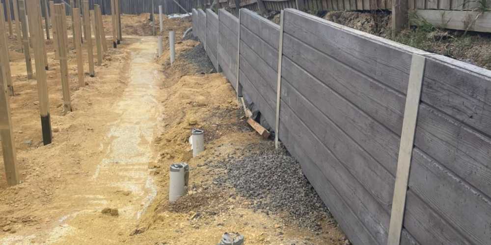 Cheapest Way to Fill Retaining Wall - Hammer Excavations